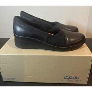 NIB Clarks Suttyn Walk Black Leather Wedge Slip On Shoes Womens Size 7.5 M